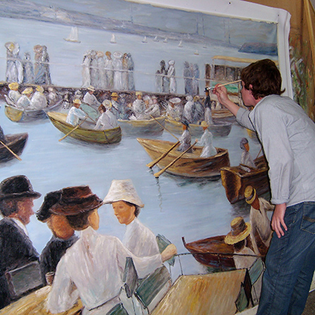 Dan touching up a painting